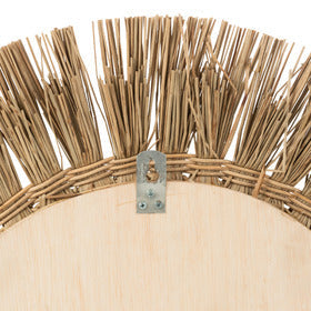 Close-up detail highlighting the woven seagrass strands and artisanal finish.